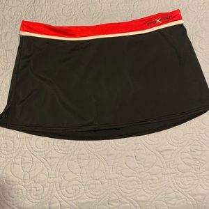 Zero Xposur swim skirt black with red waistband , size 14, NWOT